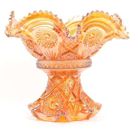 22 - A vintage iridescent carnival glass punch bowl in a marigold / amber colourway. Measures 28.5cm (dia... 