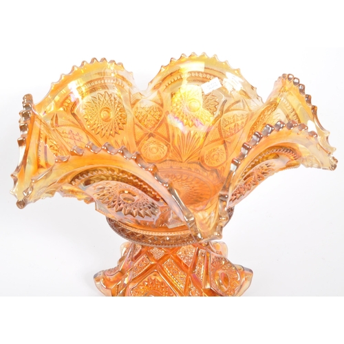 22 - A vintage iridescent carnival glass punch bowl in a marigold / amber colourway. Measures 28.5cm (dia... 