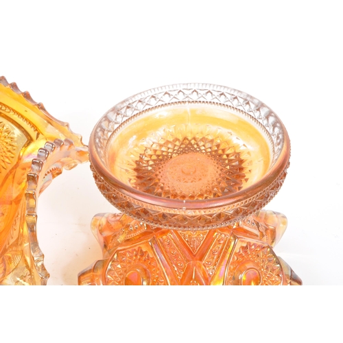 22 - A vintage iridescent carnival glass punch bowl in a marigold / amber colourway. Measures 28.5cm (dia... 