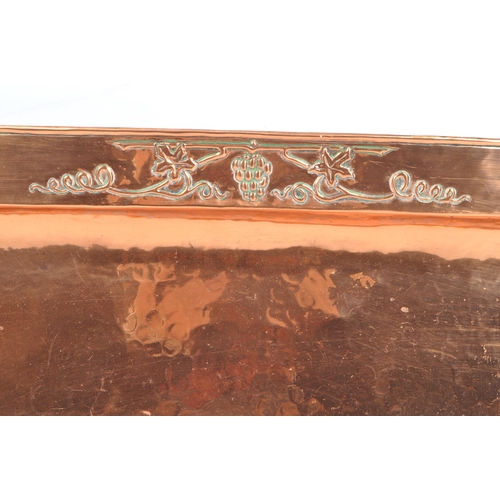 221 - An early 20th century Arts and Crafts circa tray having hammered surface to tray with edge of rounde... 