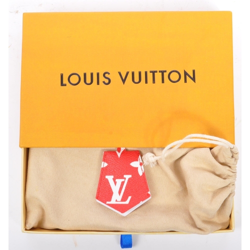 233 - A red / gold Louis Vuitton X Supreme iPhone case in original box and dust jacket.  From the 2017 Lou... 