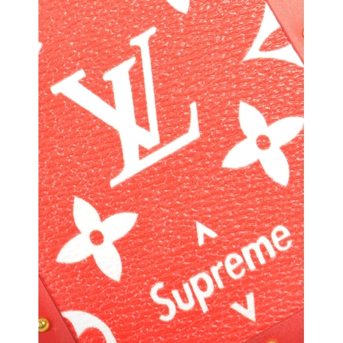 233 - A red / gold Louis Vuitton X Supreme iPhone case in original box and dust jacket.  From the 2017 Lou... 