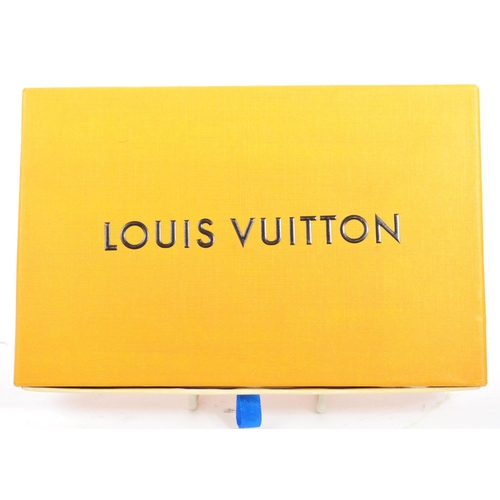 233 - A red / gold Louis Vuitton X Supreme iPhone case in original box and dust jacket.  From the 2017 Lou... 