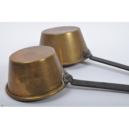 234 - A collection of 19th century Victorian copper and brass graduating saucepans. Varying sizes with bra... 