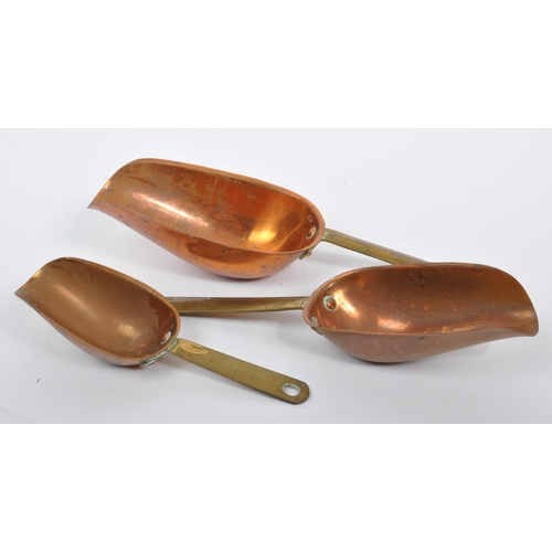 234 - A collection of 19th century Victorian copper and brass graduating saucepans. Varying sizes with bra... 