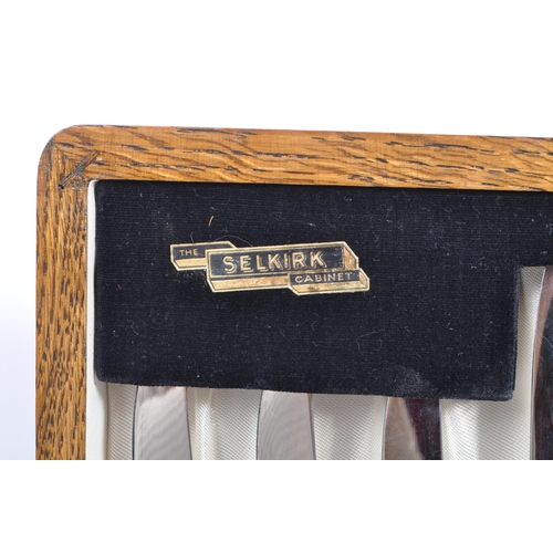 235 - Viners - A mid 20th century oak cased canteen of cutlery. Comprising of fifty pieces of stainless st... 