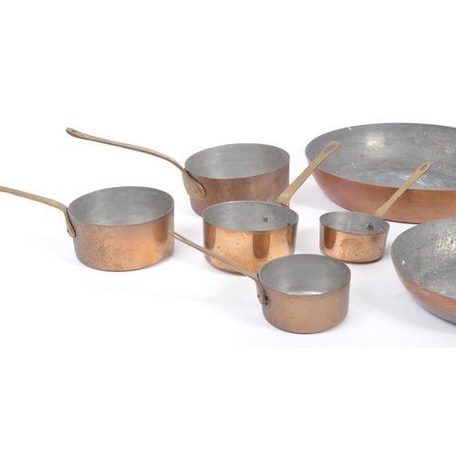 236 - A collection of 19th century Victorian copper and brass graduating frying pans. Varying sizes with b... 