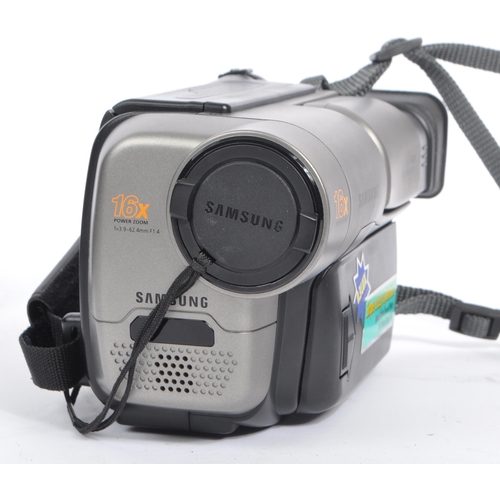 237 - A late 20th century Samsung VP-A20 video camcorder 8mm Video8 camera. The camera featuring a 3.9-62.... 