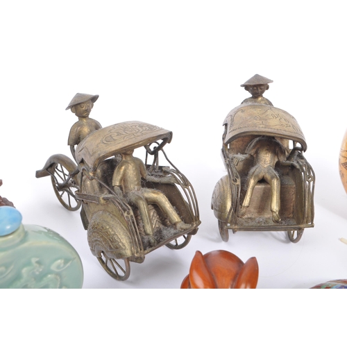 244 - A collection of 20th century Chinese curios to include an enamelled cloisonne frog pendant, a Chines... 