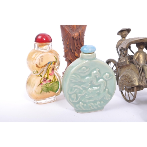 244 - A collection of 20th century Chinese curios to include an enamelled cloisonne frog pendant, a Chines... 