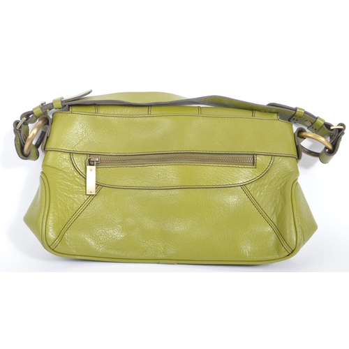 246 - Jaeger - A vintage Jaeger chartreuse green leather handbag. The bag having gilt buckle to front stam... 