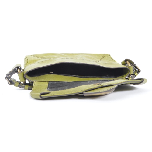 246 - Jaeger - A vintage Jaeger chartreuse green leather handbag. The bag having gilt buckle to front stam... 