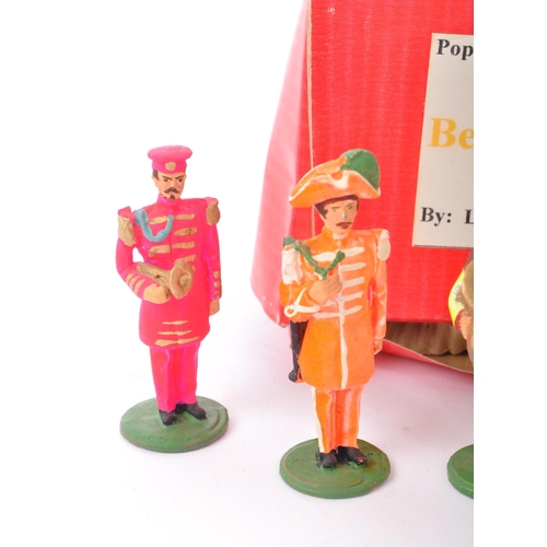 247 - The Beatles - A set of vintage 20th century Beatles band member lead figures. Sgt Pepper's Lonely He... 