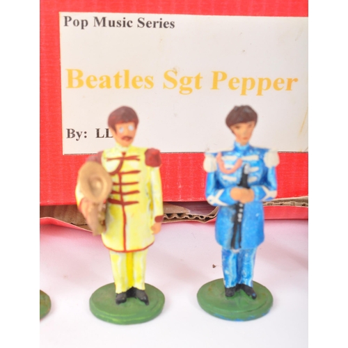 247 - The Beatles - A set of vintage 20th century Beatles band member lead figures. Sgt Pepper's Lonely He... 