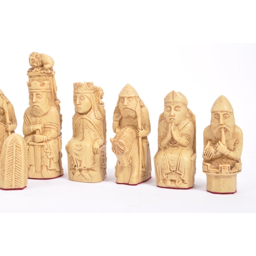 248 - The Lewis Chessmen - A full set of 20th century resin Isle of Lewis Chessmen chess pieces. Modelled ... 