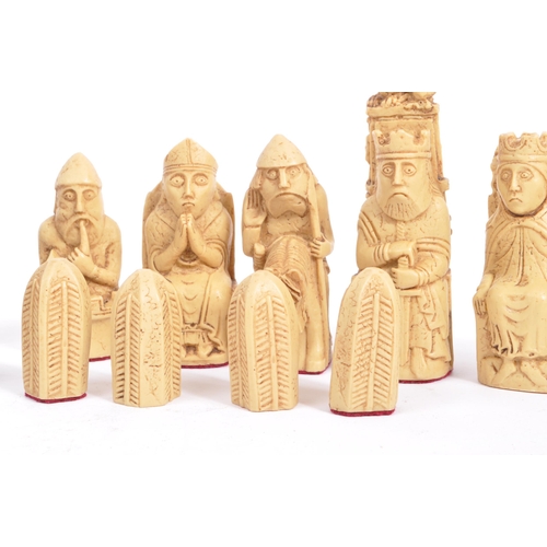 248 - The Lewis Chessmen - A full set of 20th century resin Isle of Lewis Chessmen chess pieces. Modelled ... 