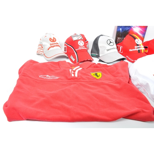 255 - A collection of contemporary formula one F1 memorabilia and clothing. The collection to include an o... 