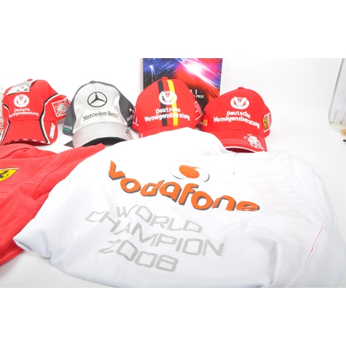 255 - A collection of contemporary formula one F1 memorabilia and clothing. The collection to include an o... 