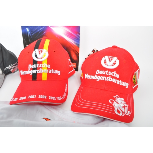 255 - A collection of contemporary formula one F1 memorabilia and clothing. The collection to include an o... 