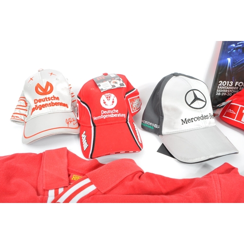 255 - A collection of contemporary formula one F1 memorabilia and clothing. The collection to include an o... 