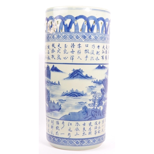 26 - A 20th century Chinese hand painted porcelain blue and white umbrella stick stand. The umbrella stan... 