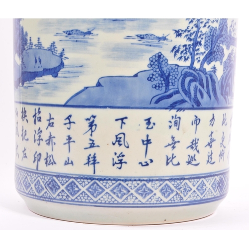 26 - A 20th century Chinese hand painted porcelain blue and white umbrella stick stand. The umbrella stan... 