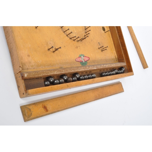 262 - A vintage mid 20th century Glevum Bagatelle marble / ball bearing board puzzle game. With curved top... 