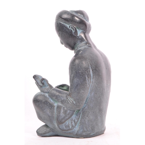 284 - A 20th century circa. 1960s Austin bronzed plaster sculpture modelled in the form of a seated Chines... 