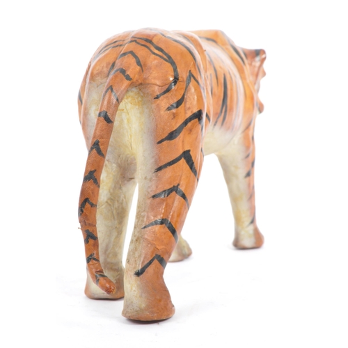 286 - A 20th century circa 1960s painted leather papier mache French tiger figure. The figure being modell... 