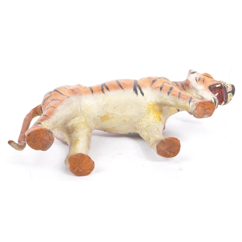 286 - A 20th century circa 1960s painted leather papier mache French tiger figure. The figure being modell... 