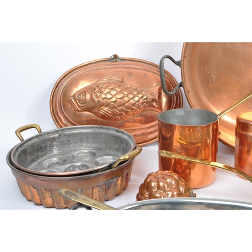 294 - A collection of early to mid 20th century brass / copper items. Including various size jelly moulds ... 