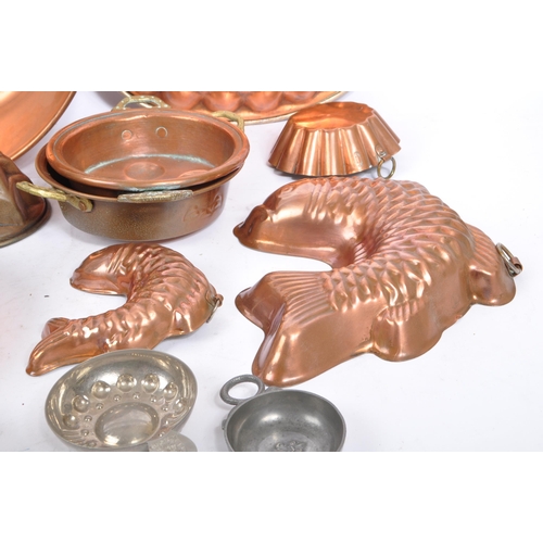 294 - A collection of early to mid 20th century brass / copper items. Including various size jelly moulds ... 