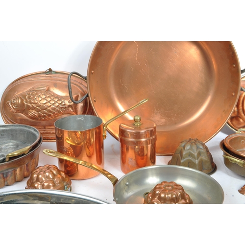 294 - A collection of early to mid 20th century brass / copper items. Including various size jelly moulds ... 