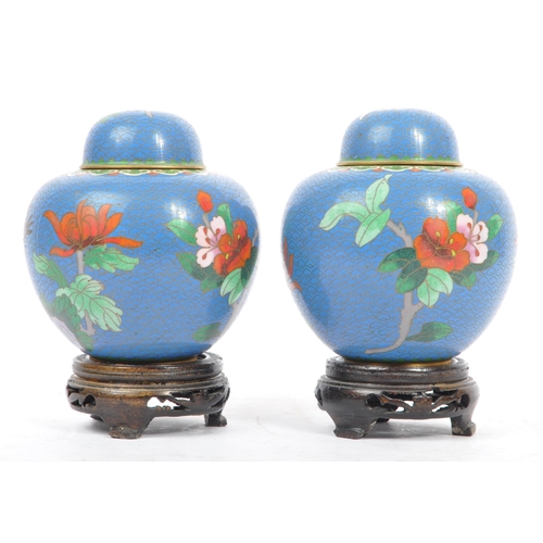 295 - A pair of vintage 20th century Chinese cloisonne ginger jars with covers. With blue ground, floral d... 