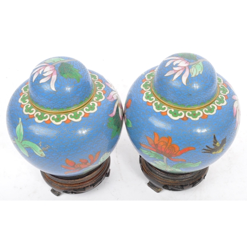 295 - A pair of vintage 20th century Chinese cloisonne ginger jars with covers. With blue ground, floral d... 