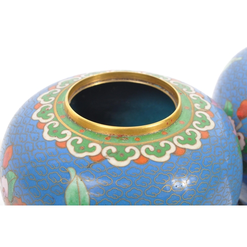 295 - A pair of vintage 20th century Chinese cloisonne ginger jars with covers. With blue ground, floral d... 