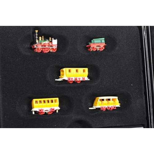 296 - A collection of assorted Atlas Editions model Minitrains rail locomotives, along with a collection o... 