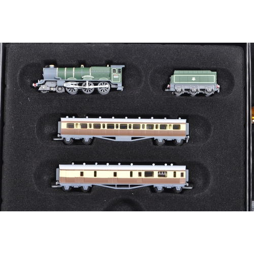 296 - A collection of assorted Atlas Editions model Minitrains rail locomotives, along with a collection o... 