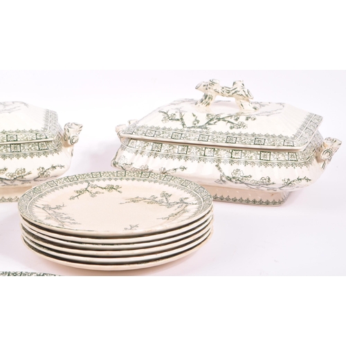 31 - A Victorian green and white dinner service by Keeling & Co - Late Myers 'Cherry Blossom' pattern to ... 