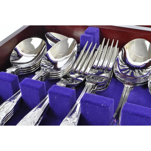 311 - A mid 20th century circa 1970's mahogany cased silver plated 18/8 stainless steel flatware
 canteen ... 