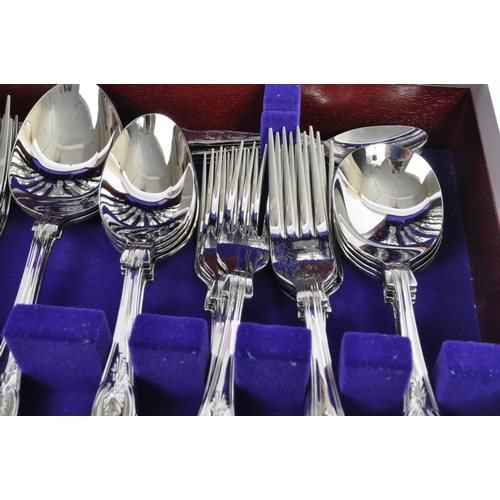 311 - A mid 20th century circa 1970's mahogany cased silver plated 18/8 stainless steel flatware
 canteen ... 