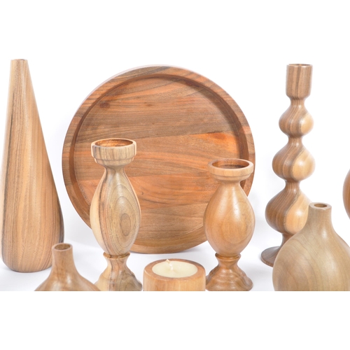 312 - A large collection of contemporary fruitwood decorative ornaments. The collection to include various... 