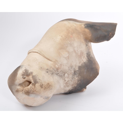 315 - A contemporary handmade ceramic art cows head. An abstract slab rolled clay cows head of eyeless des... 