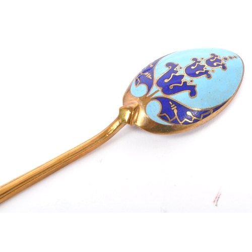 318 - A vintage 20th century enamelled teaspoon set. A set of six with cobalt blue & sky blue enamel decor... 