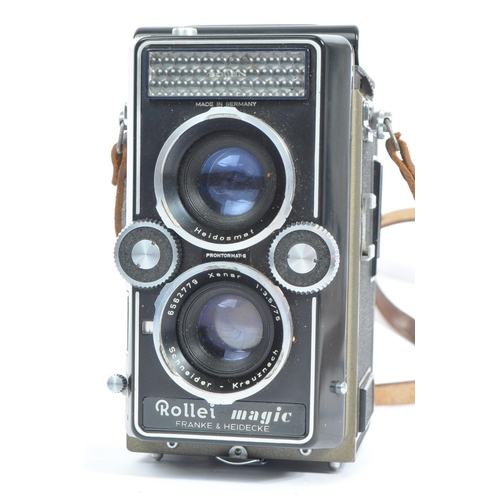 330 - A mid 20th century circa 1960s Franke and Heidecke Rollei Magic medium format TLR camera. The camera... 