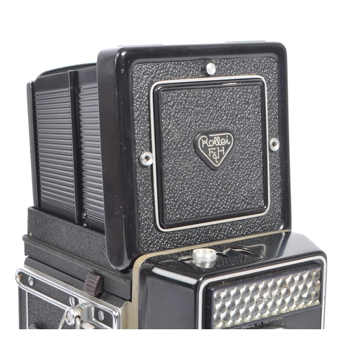 330 - A mid 20th century circa 1960s Franke and Heidecke Rollei Magic medium format TLR camera. The camera... 