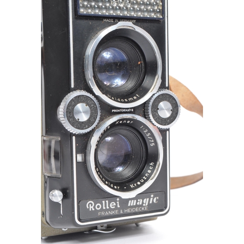 330 - A mid 20th century circa 1960s Franke and Heidecke Rollei Magic medium format TLR camera. The camera... 