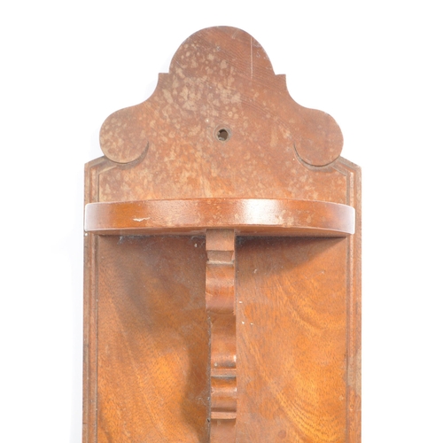 333 - Arts and Crafts style early 20th century toilet roll holder. Copper effect plaque with 