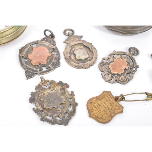 341 - A collection of vintage 20th century silver pendant necklace medals, with hallmarks. Total weight. 4... 