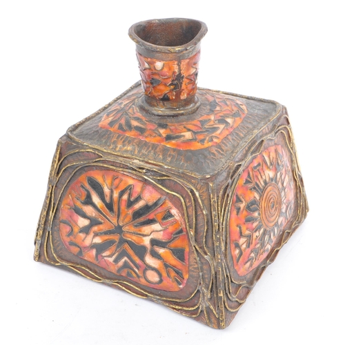 344 - An early 20th century Middle Eastern influence enamelled brass vase. The vase having a square base, ... 